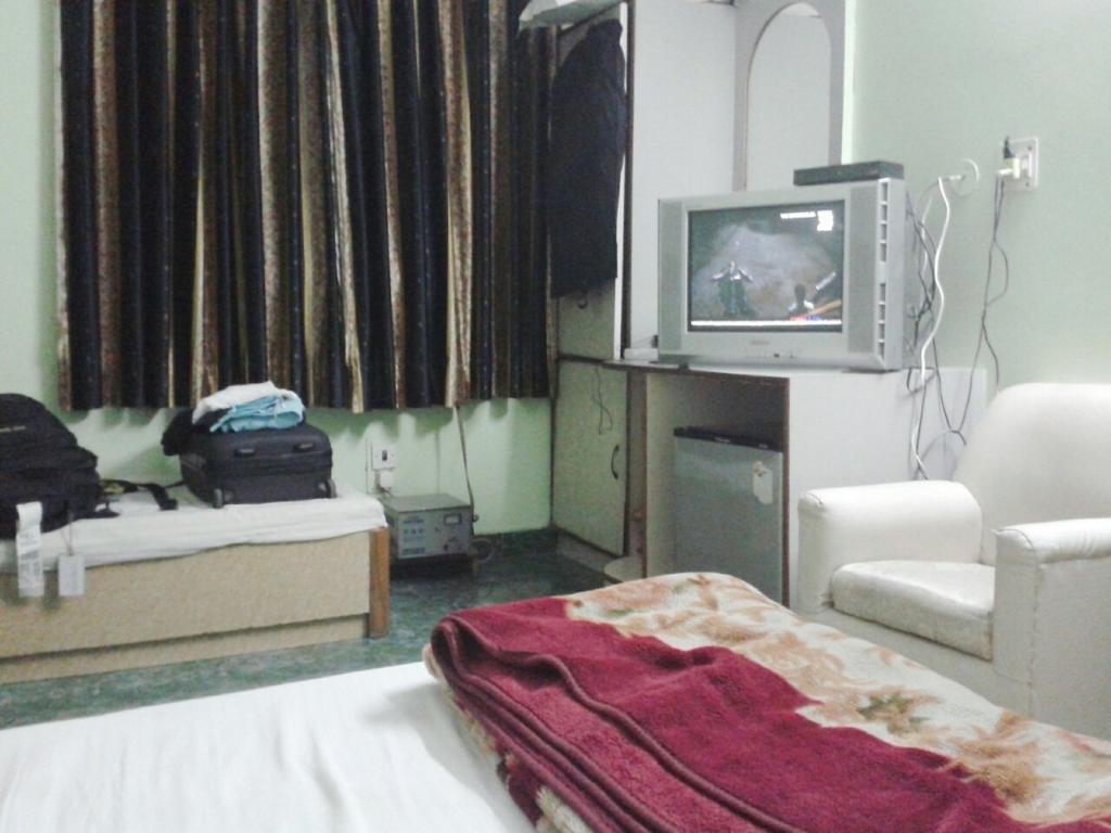 Hotel Woodland Deluxe New Delhi Exteriör bild